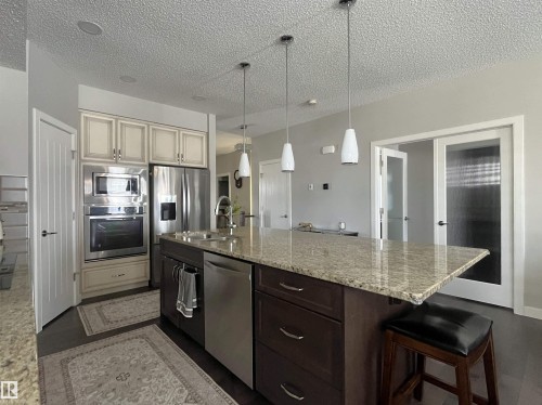 8504 216 Street, Edmonton, AB - Indoor Photo Showing Kitchen With Stainless Steel Kitchen With Double Sink With Upgraded Kitchen
