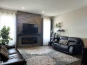 8504 216 Street, Edmonton, AB  - Indoor Photo Showing Living Room With Fireplace 