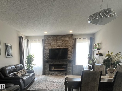 8504 216 Street, Edmonton, AB - Indoor Photo Showing Living Room With Fireplace