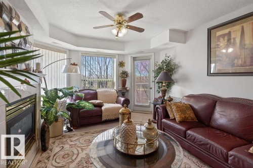 405 6703 172 Street, Edmonton, AB - Indoor Photo Showing Living Room With Fireplace