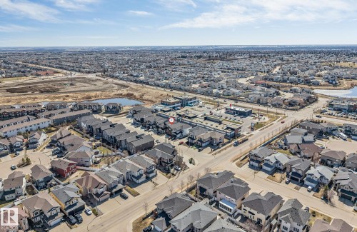 Aerial perspective showcasing a residential neighborhood with diverse architectural styles - 7007 169 Avenue Nw, Edmonton, AB - Outdoor With View