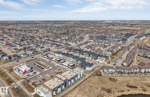 Expansive aerial perspective showcasing a developed residential neighborhood with varied housing styles - 7007 169 Avenue Nw, Edmonton, AB - Outdoor With View