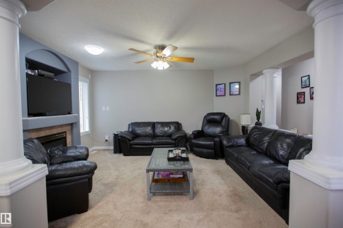 2817 40A Avenue, Edmonton, AB - Indoor Photo Showing Living Room With Fireplace