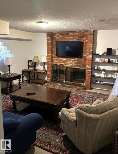 11035 166 Avenue, Edmonton, AB - Indoor Photo Showing Living Room With Fireplace
