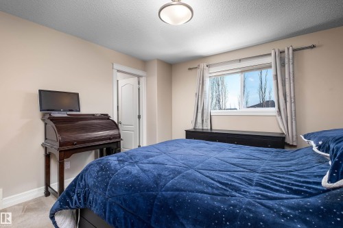 4 Spring Grove Crescent, Spruce Grove, AB - Indoor Photo Showing Bedroom