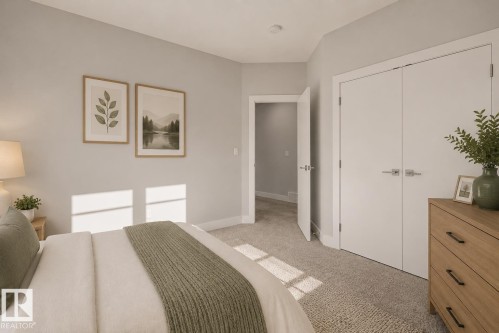 Neutral-toned interior room featuring light gray walls, plush gray carpeting, and white trim. Virtually Staged. - 635 42 Street, Edmonton, AB - Indoor Photo Showing Bedroom