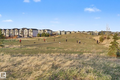 Expansive open green space with varied terrain and established coniferous trees - 635 42 Street, Edmonton, AB - Outdoor With View
