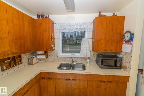 5915 115 Street, Edmonton, AB - Indoor Photo Showing Kitchen With Double Sink