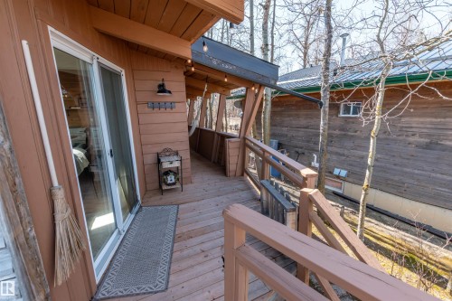 Convenient patio door just off the living room. - 197 51268 Range Road 204, Rural Strathcona County, AB 