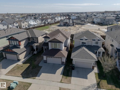 Contemporary two-story residence with attached garage and paved driveway - 151 Caledonia Drive, Leduc, AB - Outdoor With Facade