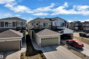 Two-story residence featuring a two-car garage and a paved driveway - 319 36 Avenue, Edmonton, AB  - Outdoor With Facade 