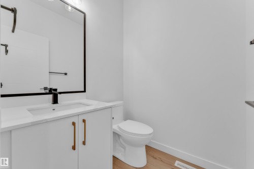 Bathroom featuring a modern vanity with white cabinetry, a white countertop, and a rectangular undermount sink - 173 Graybriar Drive, Stony Plain, AB - Indoor Photo Showing Bathroom