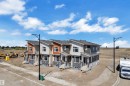 Contemporary townhome exteriors featuring varied siding materials and stone accents - 173 Graybriar Drive, Stony Plain, AB  - Outdoor 