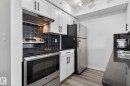 412 3315 James Mowatt Trail, Edmonton, AB  - Indoor Photo Showing Kitchen With Double Sink 