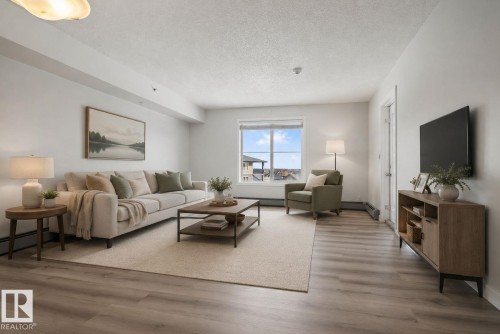412 3315 James Mowatt Trail, Edmonton, AB - Indoor Photo Showing Living Room