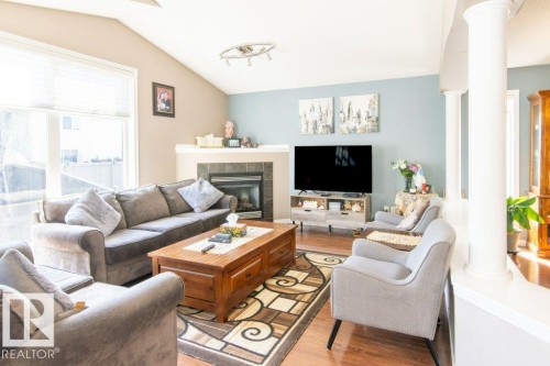 6103 5 Avenue, Edmonton, AB - Indoor Photo Showing Living Room With Fireplace