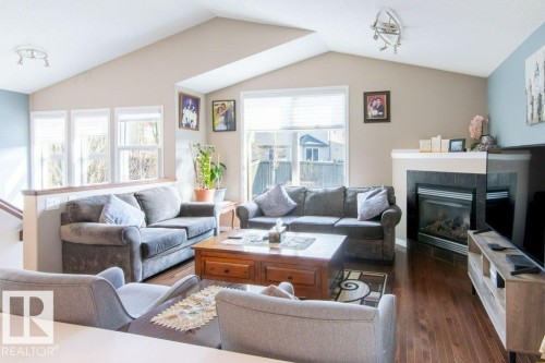 6103 5 Avenue, Edmonton, AB - Indoor Photo Showing Living Room With Fireplace