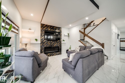 6903 173 Avenue, Edmonton, AB - Indoor Photo Showing Living Room With Fireplace