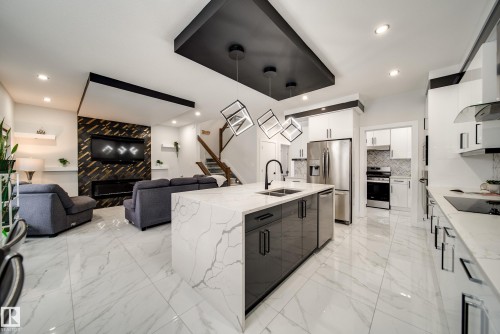 6903 173 Avenue, Edmonton, AB - Indoor Photo Showing Kitchen With Double Sink With Upgraded Kitchen