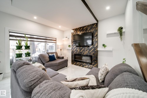 6903 173 Avenue, Edmonton, AB - Indoor Photo Showing Living Room With Fireplace