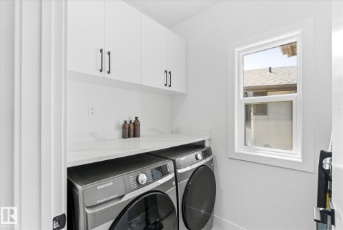 14 Enns Crest, Fort Saskatchewan, AB - Indoor Photo Showing Laundry Room