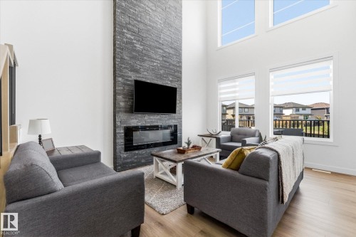 14 Enns Crest, Fort Saskatchewan, AB - Indoor Photo Showing Living Room With Fireplace