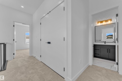 Upper-level hallway featuring neutral carpeting and white walls - 171 Graybriar Drive, Stony Plain, AB - Indoor Photo Showing Other Room