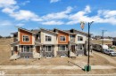 Modern townhome exteriors featuring varied siding, stone accents, and distinct rooflines - 171 Graybriar Drive, Stony Plain, AB  - Outdoor With Facade 