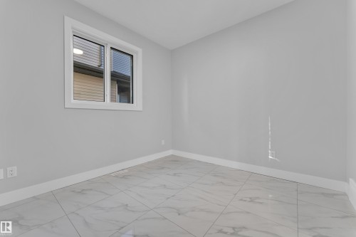 213 Crystal Creek, Leduc, AB - Indoor Photo Showing Other Room