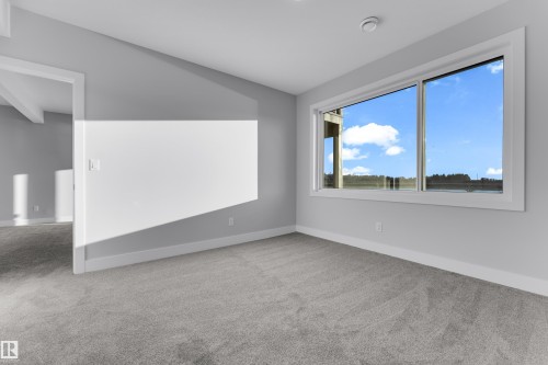 213 Crystal Creek, Leduc, AB - Indoor Photo Showing Other Room