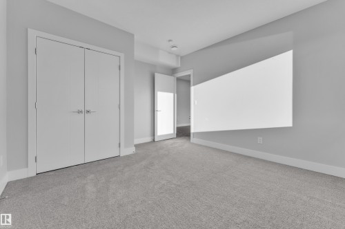 213 Crystal Creek, Leduc, AB - Indoor Photo Showing Other Room
