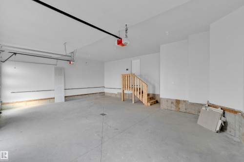 213 Crystal Creek, Leduc, AB - Indoor Photo Showing Garage