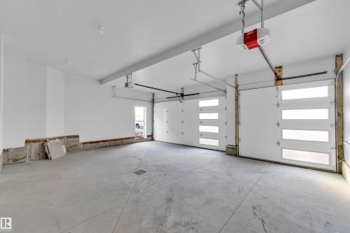 213 Crystal Creek, Leduc, AB - Indoor Photo Showing Garage