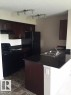 206 12035 22 Avenue Sw, Edmonton, AB  - Indoor Photo Showing Kitchen With Double Sink 
