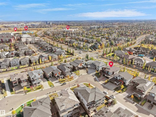 Aerial perspective showcasing a residential neighborhood with varied architectural styles - 913 Wood Place, Edmonton, AB - Outdoor With View