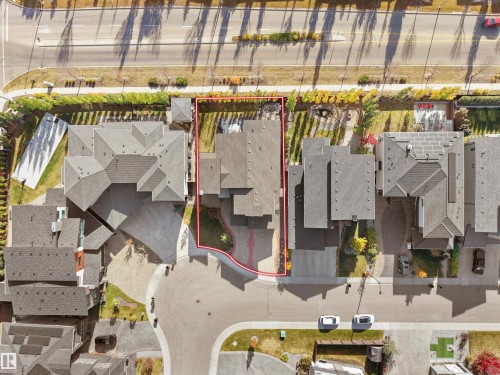 Aerial perspective showcasing a residential property with a multi-gabled roofline and an extensive paved driveway - 913 Wood Place, Edmonton, AB - Indoor Photo Showing Basement