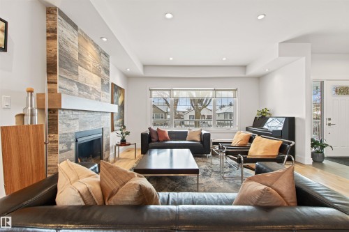 11324 87 Street, Edmonton, AB - Indoor Photo Showing Living Room With Fireplace