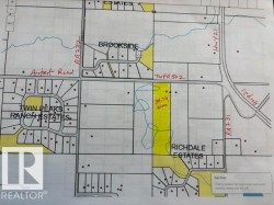 Plat Map. Illustrating property divisions and roadways within the depicted area - 
