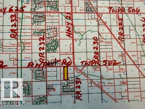 Property Plat Map. Illustrating the division of land into lots and parcels, including road designations and boundaries for the property - 23133 Twp Rd 502, Rural Leduc County, AB - Other