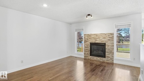 1346 Potter Greens Drive, Edmonton, AB - Indoor Photo Showing Living Room With Fireplace
