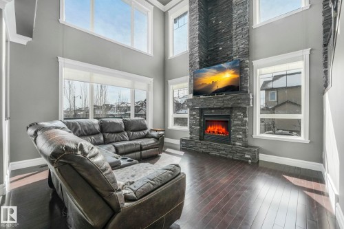 1360 Cunningham Drive, Edmonton, AB - Indoor Photo Showing Living Room With Fireplace