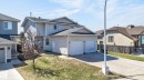 Two-story residence featuring light gray siding exterior and a two-car attached garage - 4603 126 Avenue, Edmonton, AB  - Outdoor 