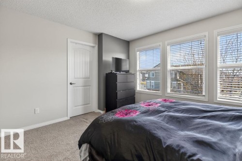Bright bedroom with neutral wall paint - 17540 58 Street Nw, Edmonton, AB 