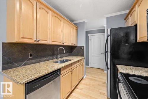 201 10547 83 Avenue, Edmonton, AB - Indoor Photo Showing Kitchen With Double Sink