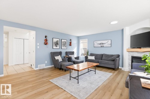 3 Middleton Close, Leduc, AB - Indoor Photo Showing Living Room With Fireplace