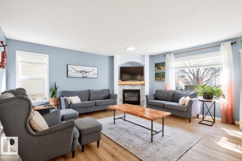 3 Middleton Close, Leduc, AB - Indoor Photo Showing Living Room With Fireplace