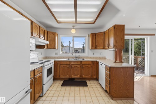 2013 3 Avenue, Cold Lake, AB - Indoor Photo Showing Kitchen With Double Sink