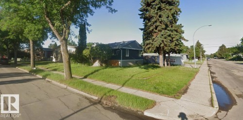 Single-story residence featuring dark siding and a light-colored foundation - 11834 44 Street, Edmonton, AB - Outdoor