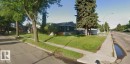 Single-story residence featuring dark siding and a light-colored foundation - 11834 44 Street, Edmonton, AB  - Outdoor 