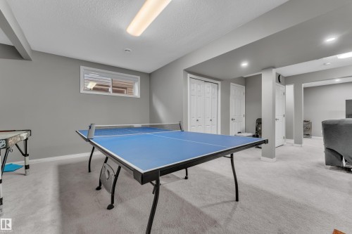 Finished lower level featuring recessed lighting, a white trim package, and light gray carpeting - 5520 5 Avenue, Edmonton, AB - Indoor Photo Showing Other Room